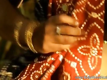 Indian ultra-cutie is leisurely interesting off her clothes in front of the camera, late at night
